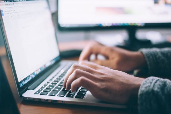 assistant working on a computer